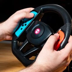 Numskull Nintendo Switch Joy Con Steering Wheel Table Attachment -Just Geek Shop ns switch steering wheel lifestyle 4